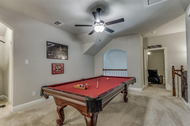 recreation room with visible vents, light carpet, arched walkways, baseboards, and ceiling fan