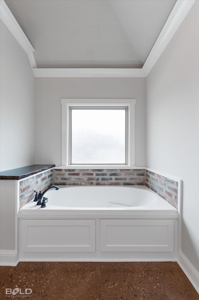 bathroom featuring a garden tub and vaulted ceiling