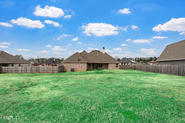 view of yard featuring a fenced backyard