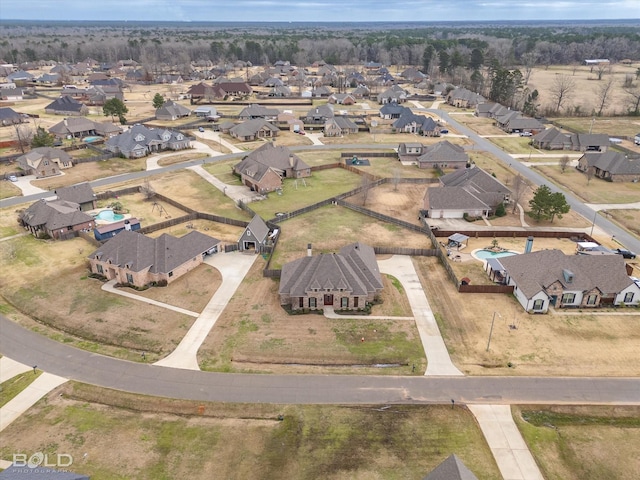 birds eye view of property with a residential view