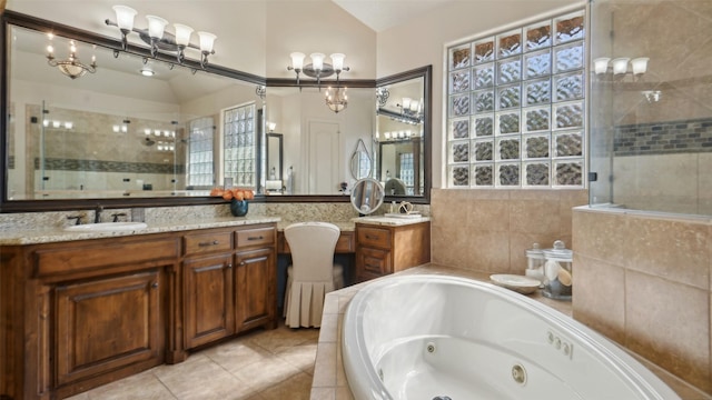 full bath with a stall shower, a tub with jets, tile patterned flooring, lofted ceiling, and vanity