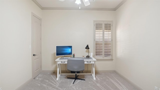 carpeted office space featuring baseboards and ornamental molding