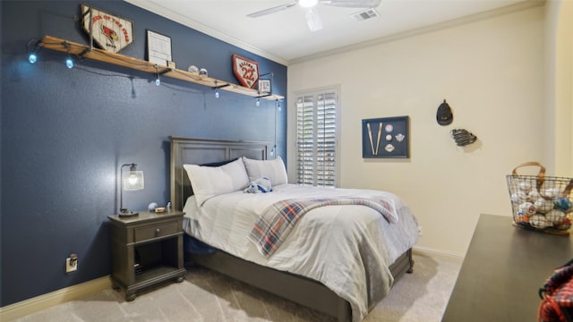 bedroom with visible vents, crown molding, baseboards, carpet, and a ceiling fan