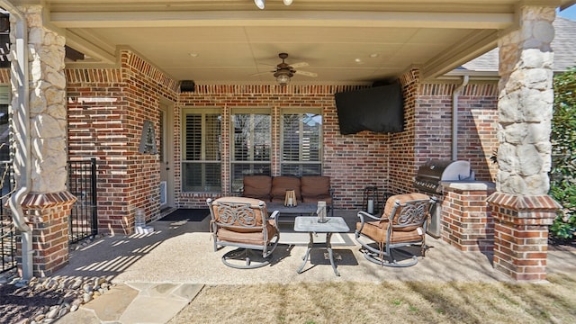 view of patio with an outdoor hangout area, area for grilling, and a ceiling fan