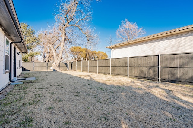 view of yard featuring a fenced backyard