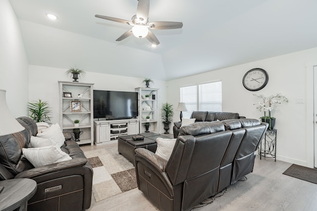 living area featuring a ceiling fan, baseboards, lofted ceiling, recessed lighting, and light wood-type flooring