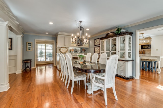 1905 Indian Creek Dr, Westover Hills, TX 76107 - dining area with a chandelier, wood finished floors, ornamental molding, and recessed lighting