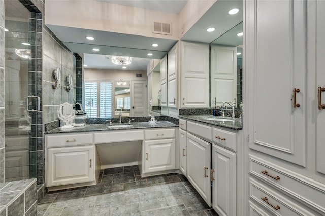 1905 Indian Creek Dr, Westover Hills, TX 76107 - full bathroom featuring a stall shower, two vanities, and recessed lighting