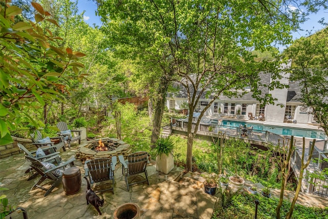 1905 Indian Creek Dr, Westover Hills, TX 76107 - view of patio featuring a fire pit and fence