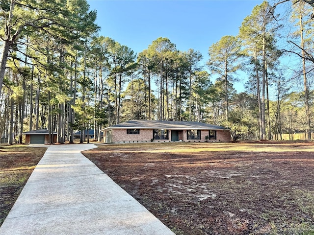 view of front of property featuring brick siding