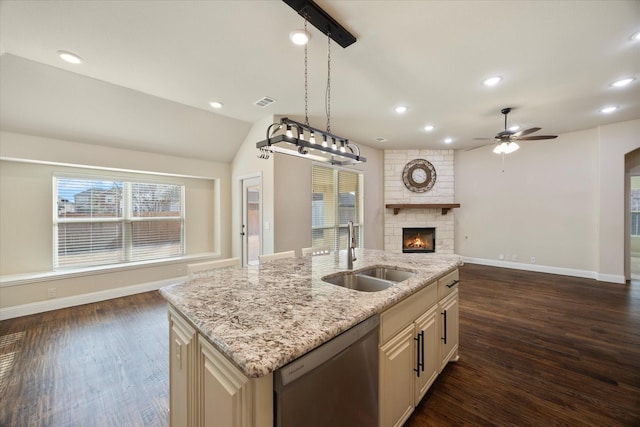 1621 Castleford Dr, Forney, TX 75126 - kitchen featuring dishwasher, a sink, open floor plan, baseboards, and healthy amount of natural light