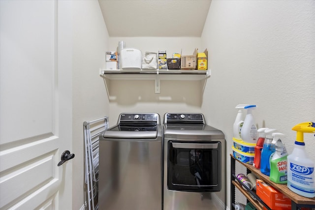 laundry area with laundry area and independent washer and dryer