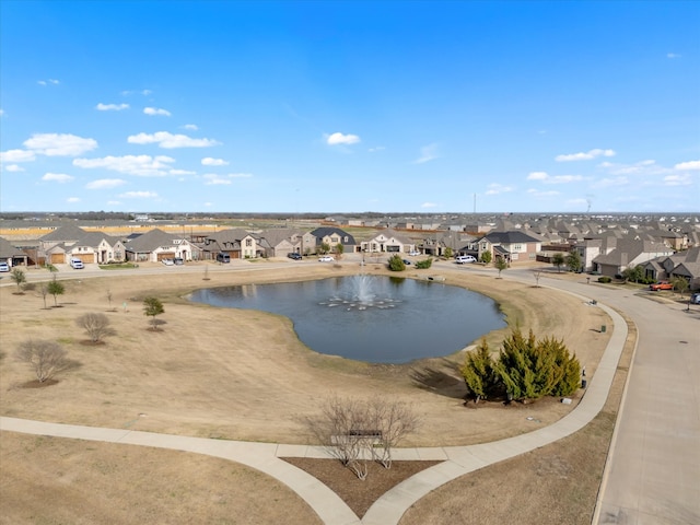 aerial view featuring a residential view and a water view