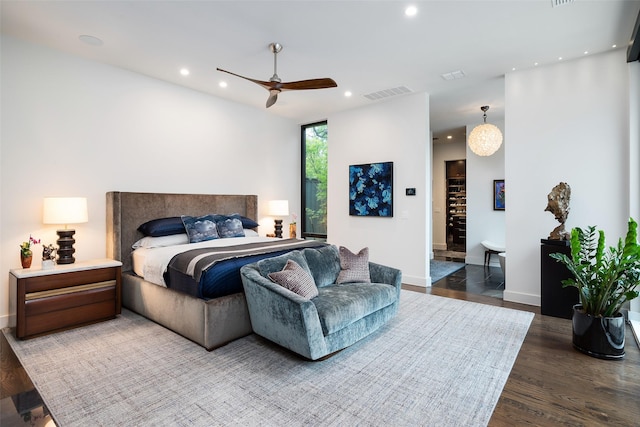 bedroom featuring visible vents, baseboards, recessed lighting, wood finished floors, and a ceiling fan