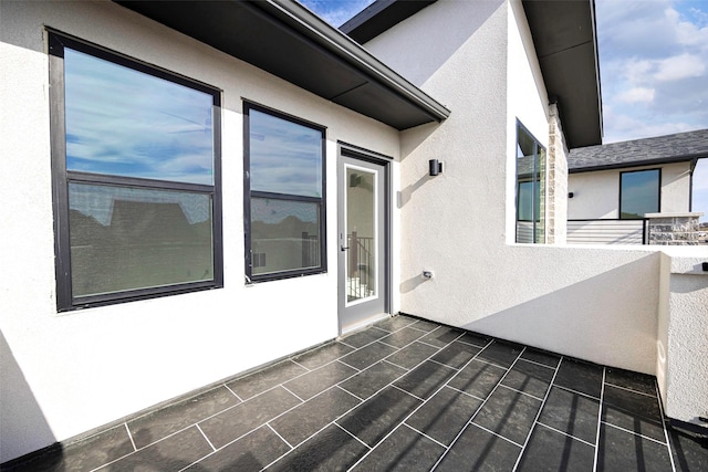 view of patio with a balcony