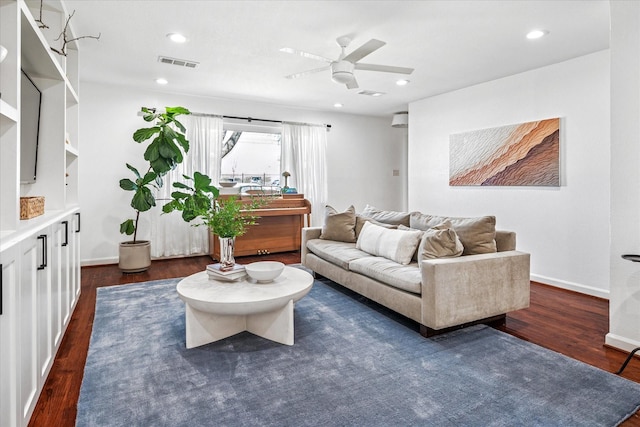 living room featuring visible vents, a ceiling fan, dark wood finished floors, recessed lighting, and baseboards