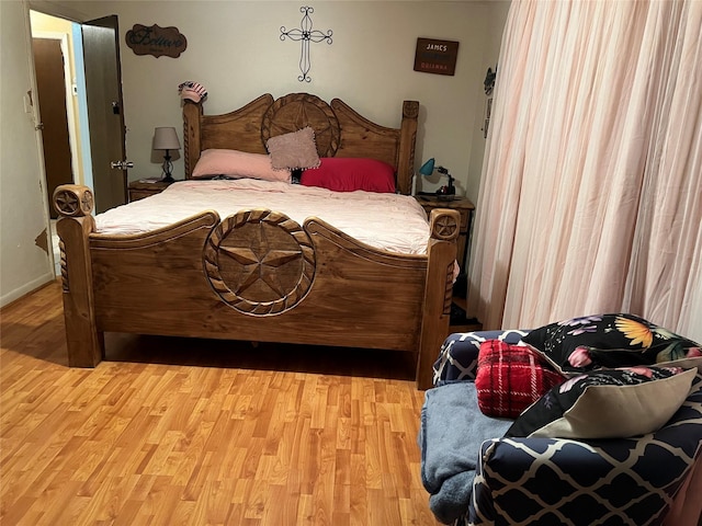 bedroom with light wood-style flooring