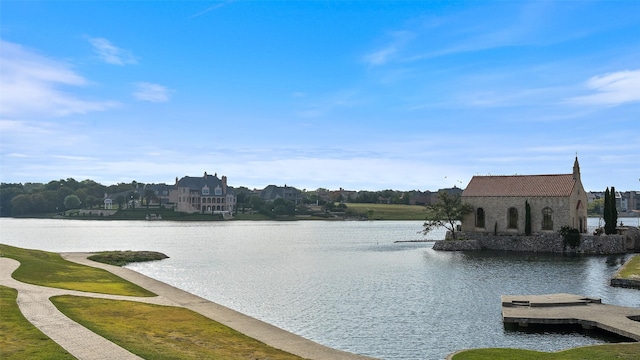 water view featuring a floating dock