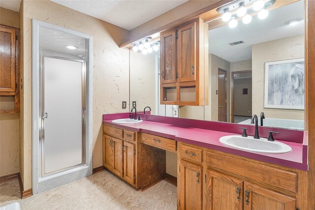 full bath featuring double vanity, visible vents, a garden tub, and a sink