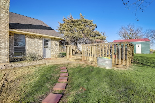 view of yard with a wooden deck