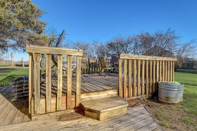 view of outbuilding featuring an outdoor structure and fence