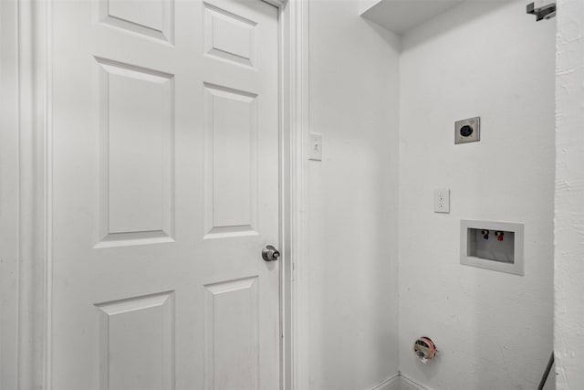 laundry area featuring laundry area, hookup for an electric dryer, and washer hookup