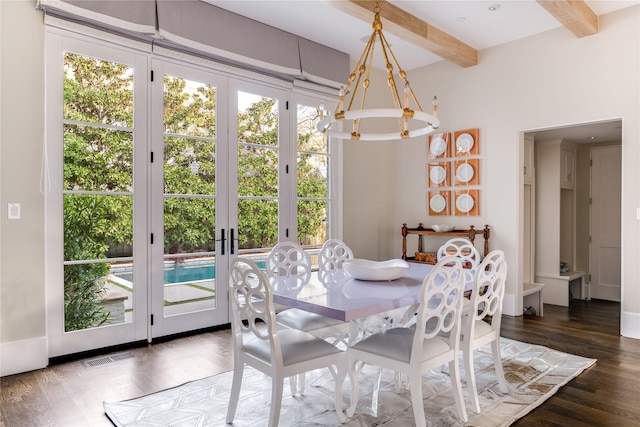 dining space featuring beamed ceiling, visible vents, and dark wood-style flooring