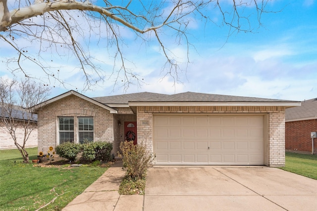 single story home with brick siding, a garage, concrete driveway, and a front yard