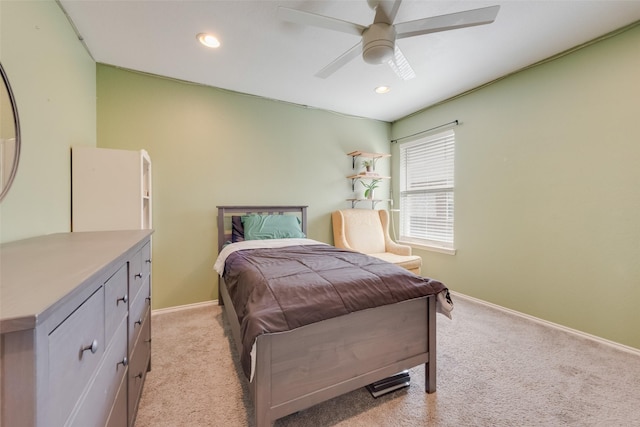 bedroom with recessed lighting, baseboards, and light colored carpet