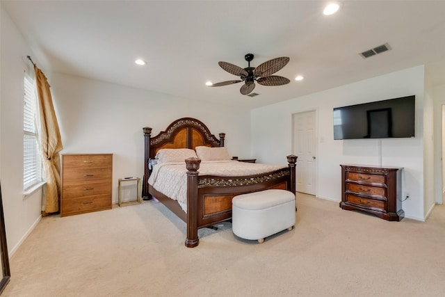 carpeted bedroom featuring visible vents, recessed lighting, baseboards, and a ceiling fan