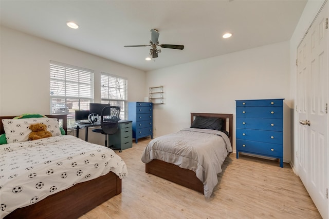 bedroom featuring a closet, recessed lighting, light wood-style flooring, and ceiling fan