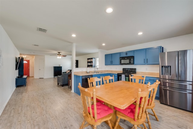 dining space with recessed lighting, visible vents, light wood finished floors, and ceiling fan