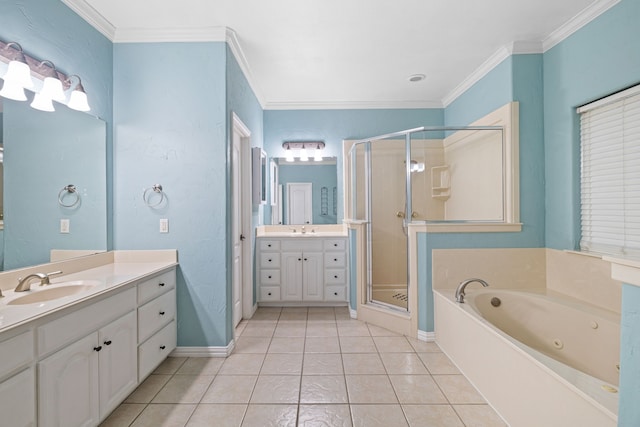 bathroom with a sink, ornamental molding, a shower stall, and tile patterned floors