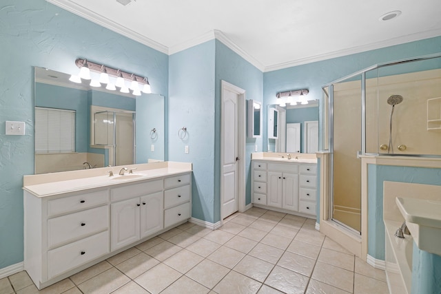 full bath featuring a shower stall, crown molding, and a sink