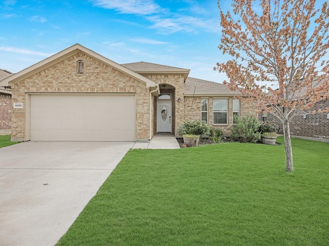 14556 Serrano Ridge Rd, Fort Worth, TX 76052 - view of front of home featuring driveway, a front yard, a garage, brick siding, and a shingled roof
