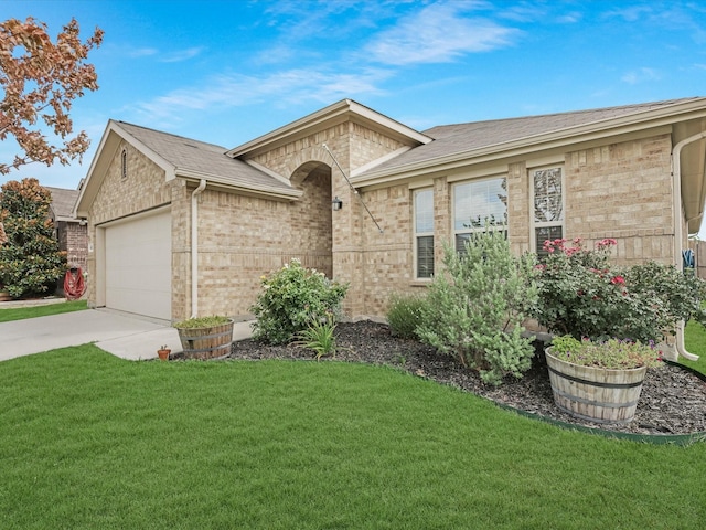 14556 Serrano Ridge Rd, Fort Worth, TX 76052 - view of front of house featuring brick siding, an attached garage, a front yard, concrete driveway, and roof with shingles