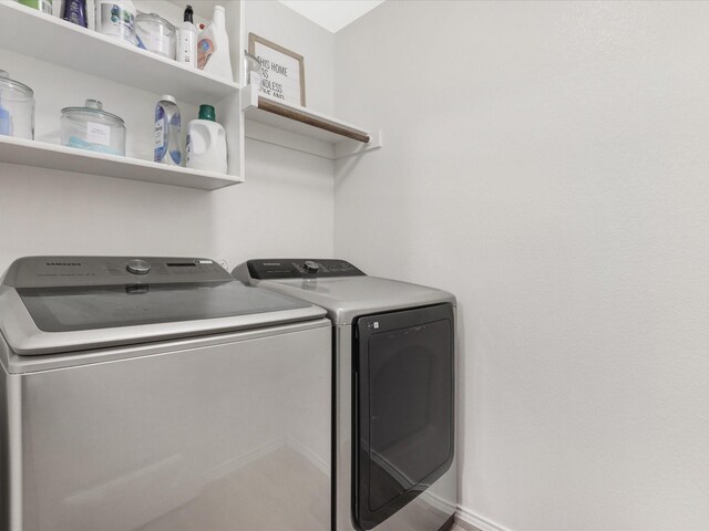 laundry area featuring laundry area and separate washer and dryer