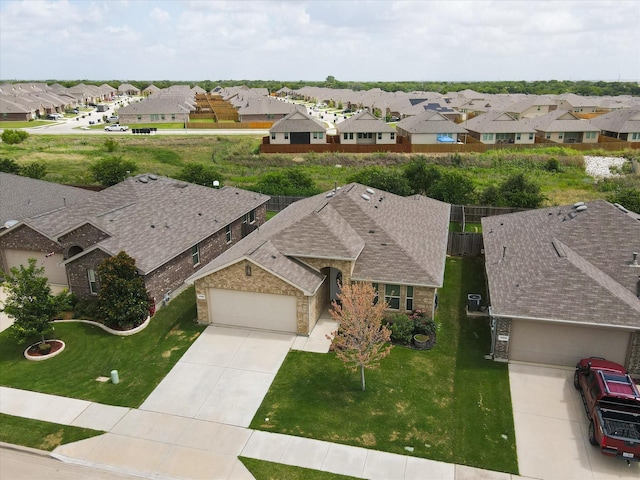 drone / aerial view with a residential view