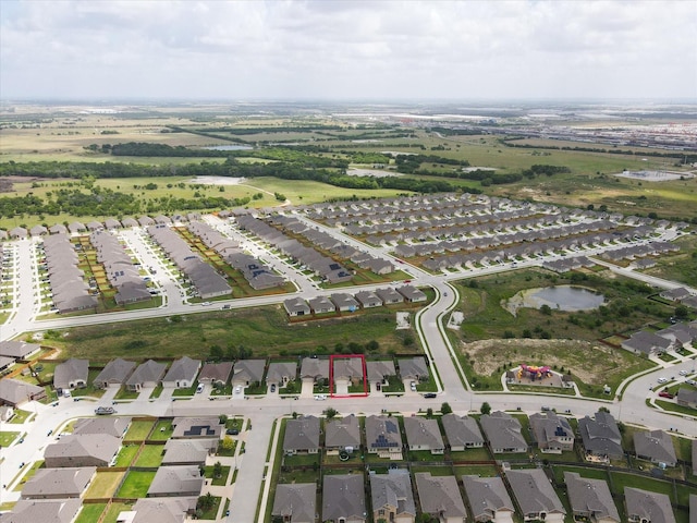 aerial view with a residential view and a water view