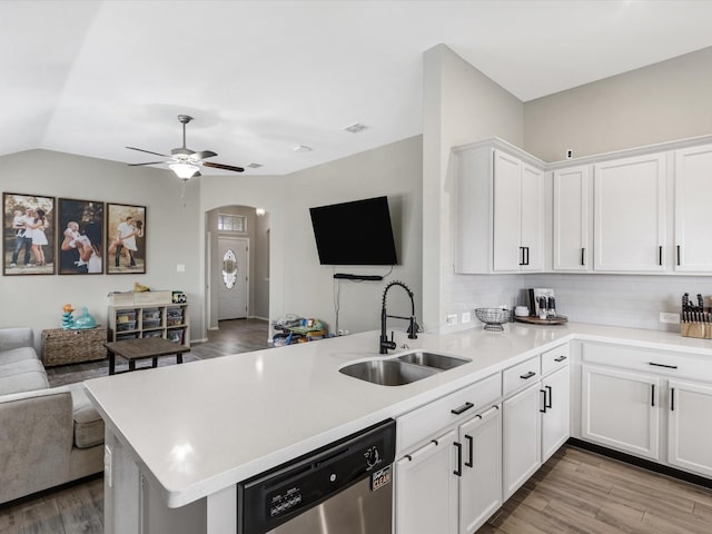 14556 Serrano Ridge Rd, Fort Worth, TX 76052 - kitchen featuring stainless steel dishwasher, open floor plan, a sink, a peninsula, and light countertops