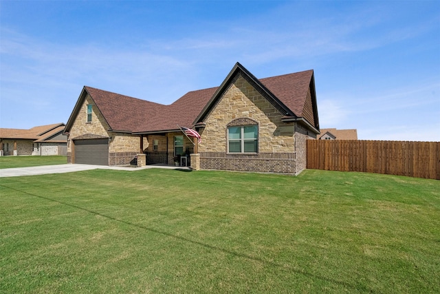 view of front facade featuring concrete driveway, a front lawn, and fence