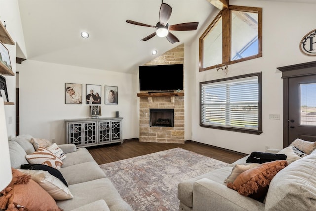 living area with high vaulted ceiling, wood finished floors, recessed lighting, a stone fireplace, and ceiling fan