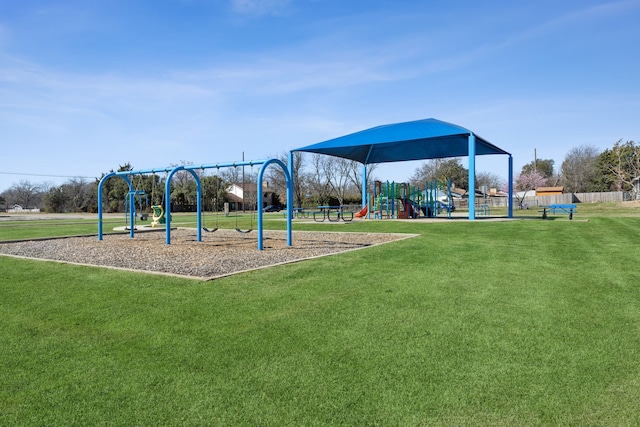 community play area with a yard