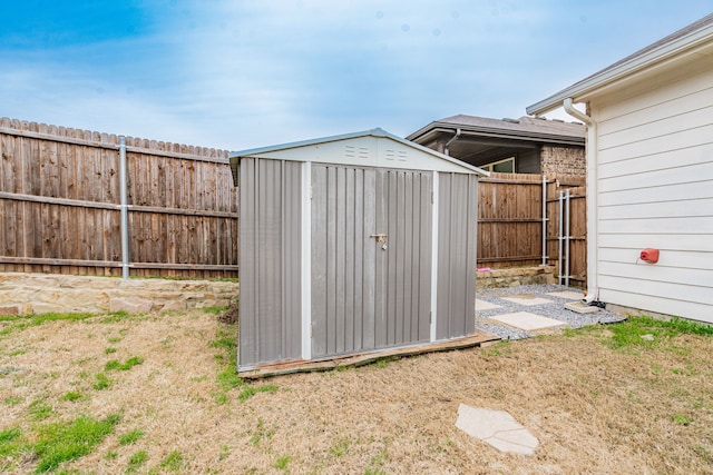 view of shed featuring a fenced backyard