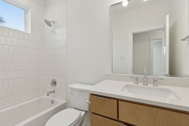 full bathroom with vanity, shower / tub combination, and toilet