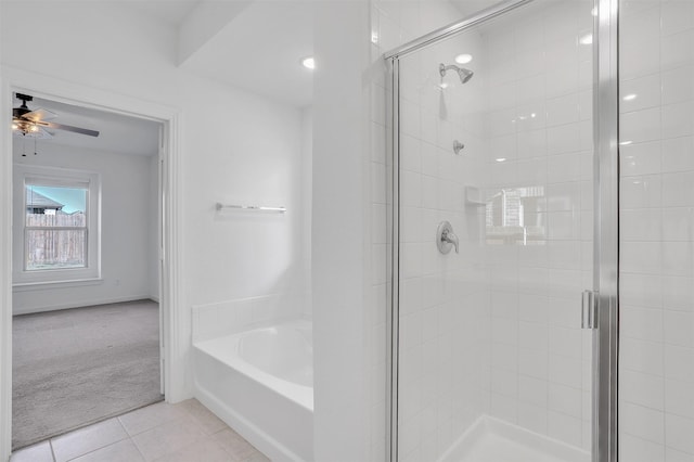 3917 Spencer Ln, Heartland, TX 75126 - full bath featuring a shower stall, tile patterned flooring, a bath, and a ceiling fan