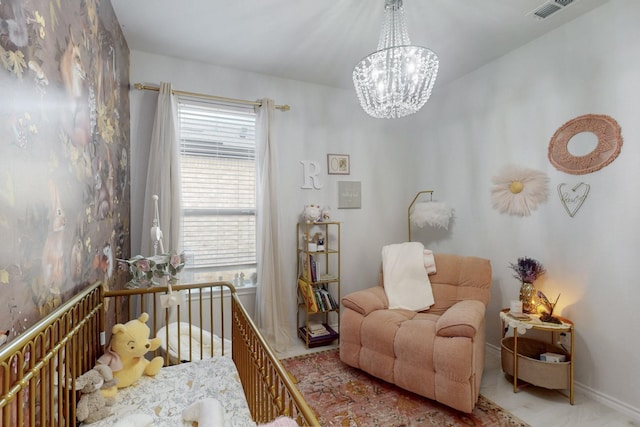 bedroom with a notable chandelier, baseboards, and visible vents