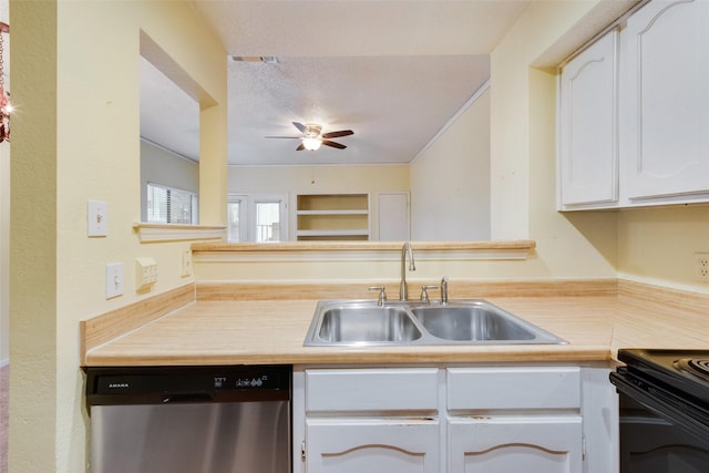 kitchen with dishwasher, light countertops, white cabinets, and a sink