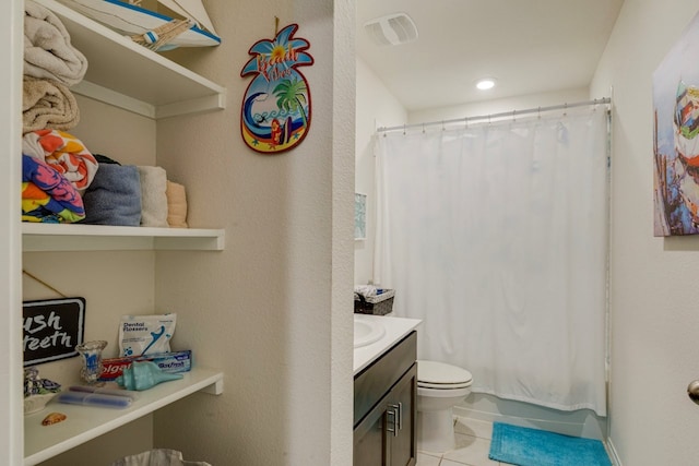 bathroom featuring vanity, visible vents, tile patterned flooring, shower / bath combination with curtain, and toilet