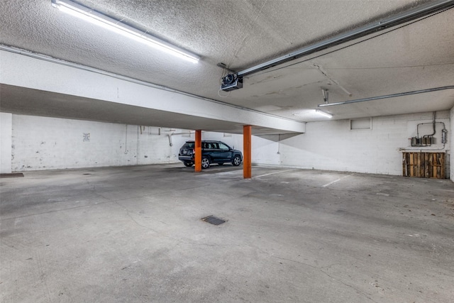 4034 Rawlins St Unit 102, Dallas, TX 75219 - parking deck with a garage door opener